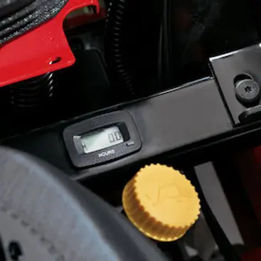 Integrated hour meter and simplified maintenance